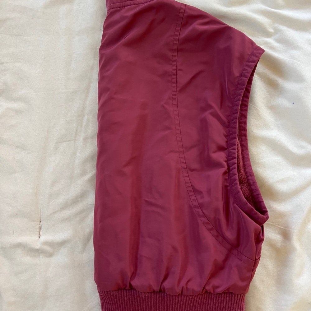 ALO Yoga Sleeveless Zip-Front Puffer Vest in Deep Berry - Picture 3 of 4